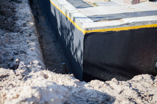 Professional Waterproofing technician working in Brussels, WI